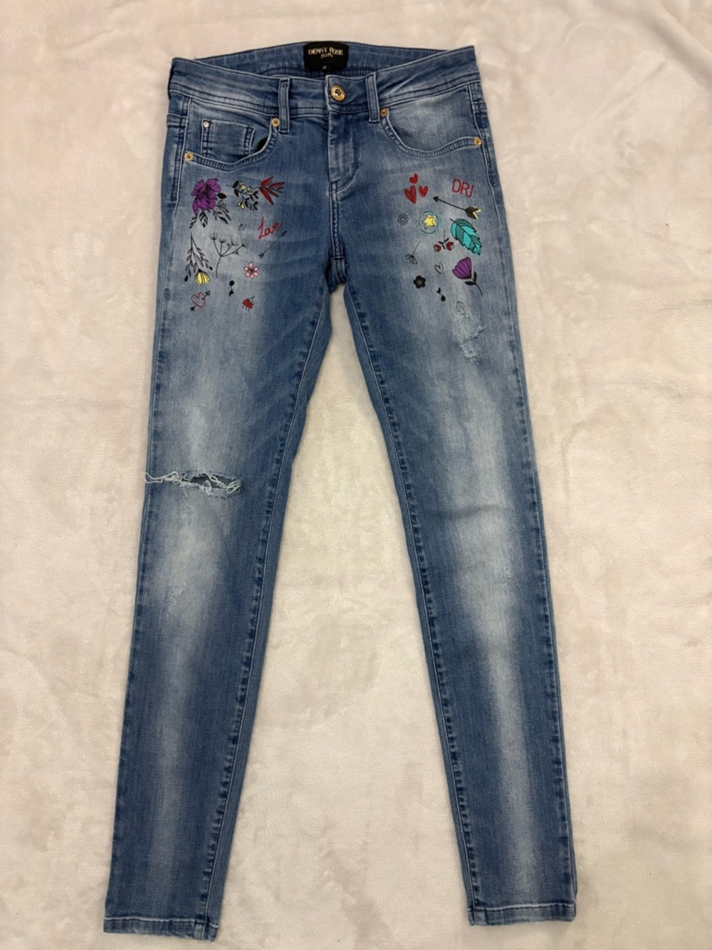 Denny rose denim jeans with floral details
